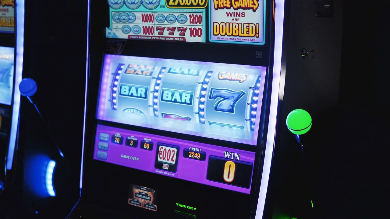 Fitur bonus permainan slot Kawi77 free spin wild multiplier scatter dan jackpot progresif
